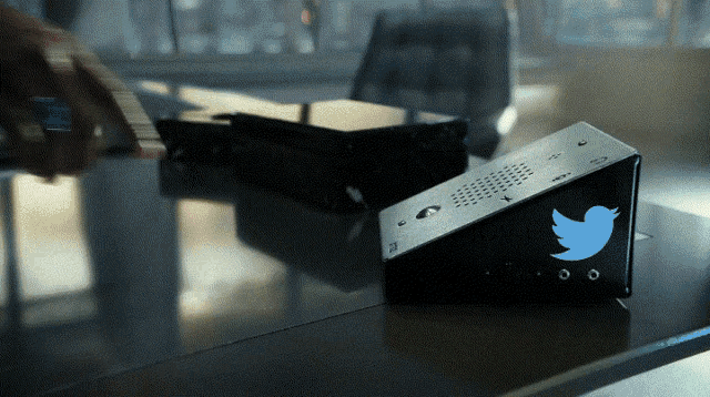 a black box with a twitter logo on it sits on a table