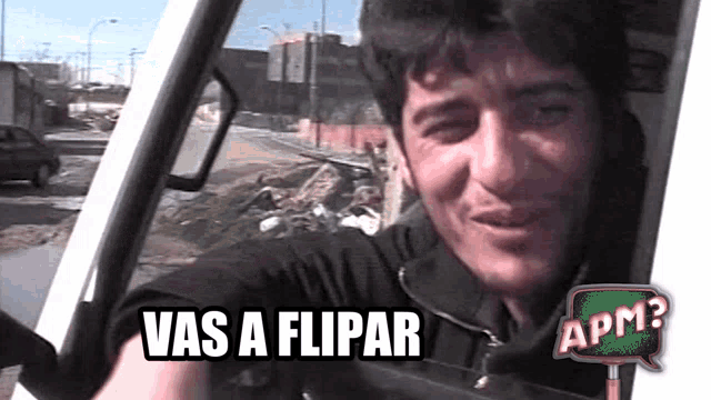 a man in a car with the words vas a flipar