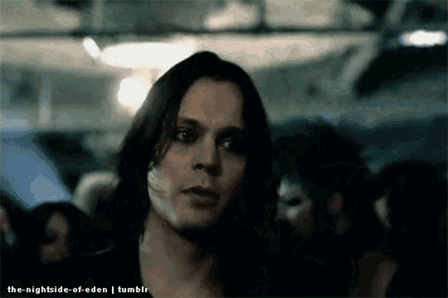 a picture of a man with long black hair and the words the-nightside-of-eden tumblr