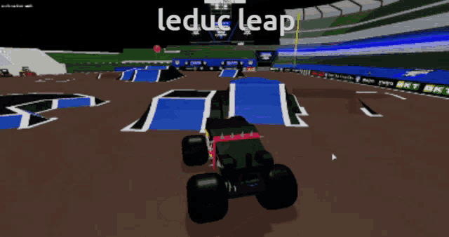 a video game screen shows a monster truck on a track with the words leduc leap above it
