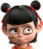a close up of a cartoon character 's face with two buns on her hair .