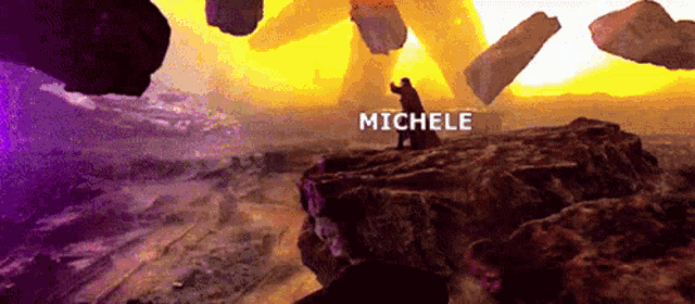a man standing on top of a rock with the name michele on it