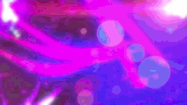 a purple and blue background with bubbles floating in it