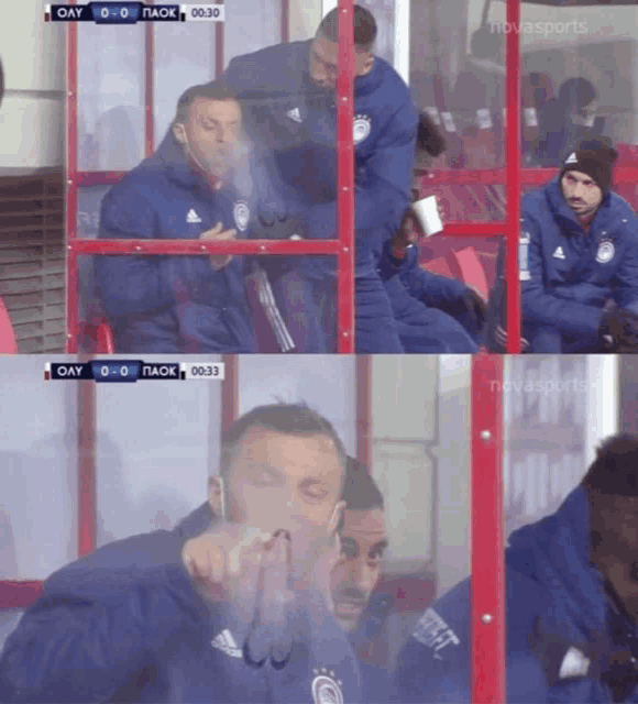 a man smoking a cigarette while watching a soccer game with novasports
