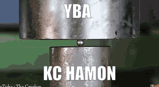 a close up of a metal object with the words yba kc hamon