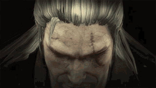 a close up of a man 's face with gray hair and a scar on his forehead