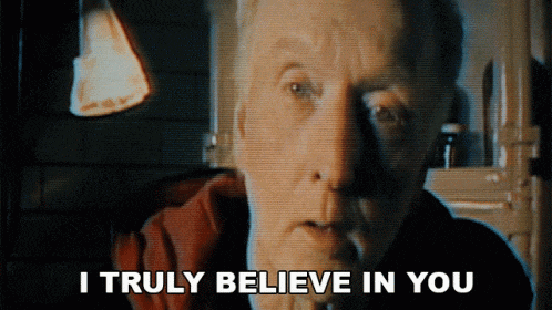 a man says i truly believe in you in a dark room