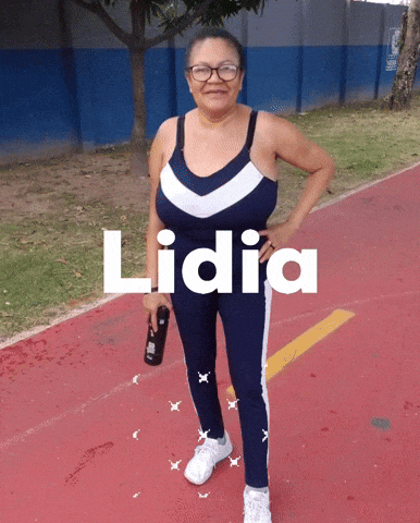 a woman stands on a red track with the name lidia written on the bottom