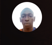 a man 's face is visible in a circle on a black background