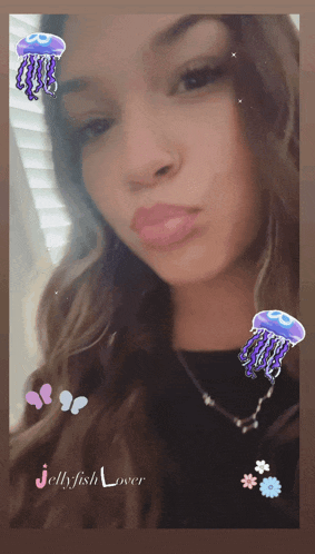 a picture of a woman with jellyfish and the words jellyfish lover