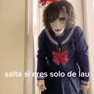 a girl in a sailor suit has the words salta si eres solo de lau on the bottom
