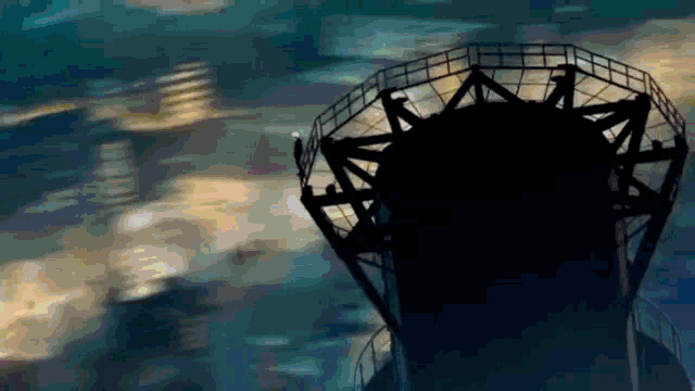 a person standing on top of a very tall building