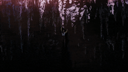 a dark background with a few spots of light