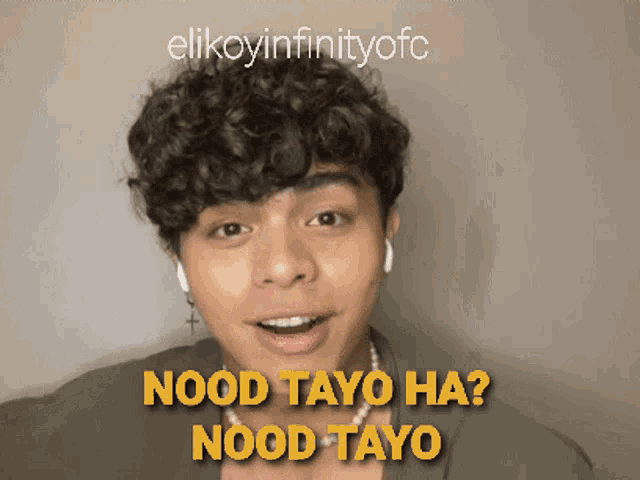 a young man with curly hair says nood tayo ha
