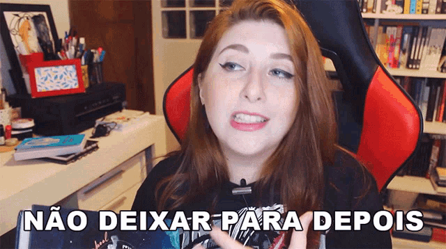 a woman sitting in a red chair with the words não deixar para depois below her