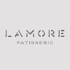 a logo for lamore patisserie on a grey background