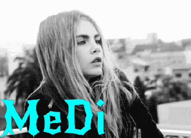a black and white photo of a woman and the word medi