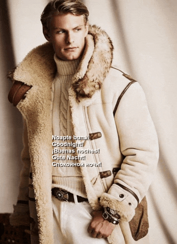 a man wearing a fur coat and a sweater says noapte buna goodnight