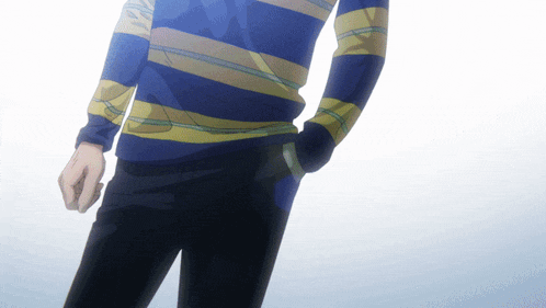 a person wearing a blue and yellow striped sweater