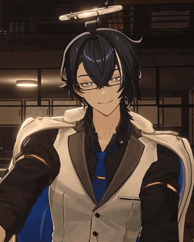 a man with long black hair and glasses is smiling