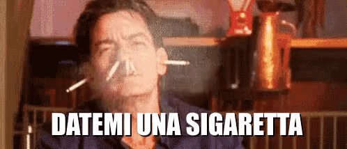 a man is smoking a cigarette and the words datemi una sigaretta are above him