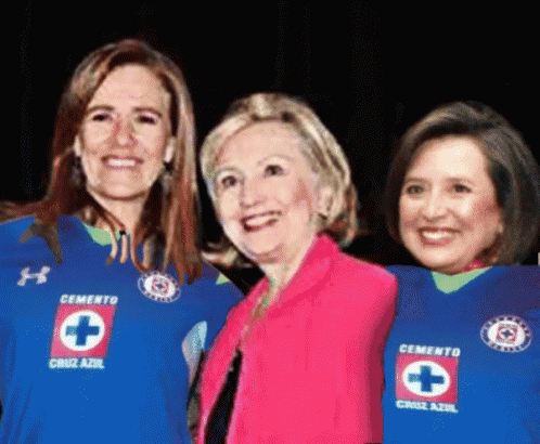 three women wearing cemento cruz azul shirts pose for a photo