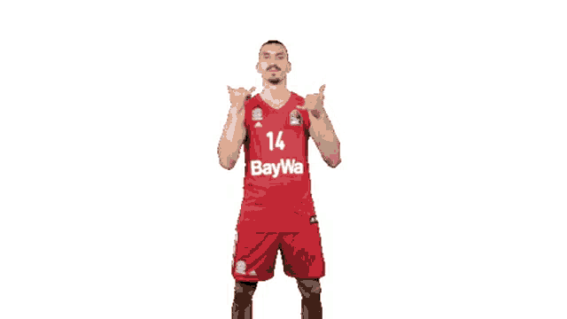 a basketball player wearing a red jersey that says baywa on it