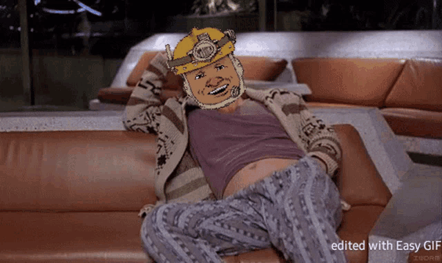 a gif of a man laying on a couch with the words edited with easy gif below it