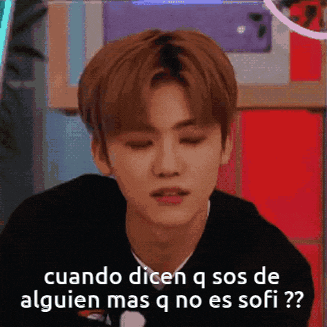 a young man with his eyes closed and the words cuando dicen q sos de alguien mas q no es sofi ?