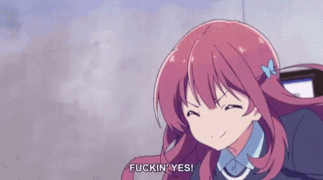 a girl with pink hair is smiling and saying fuckin ' yes