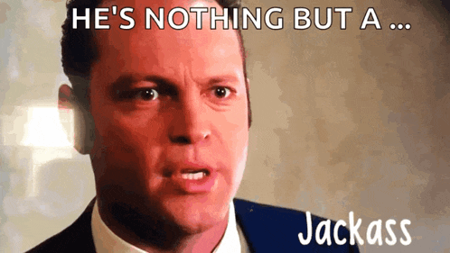 a man in a suit and tie says he 's nothing but a ... jackass