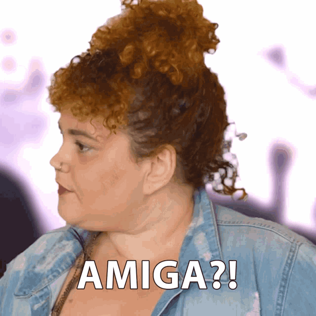 a woman with curly hair says amiga