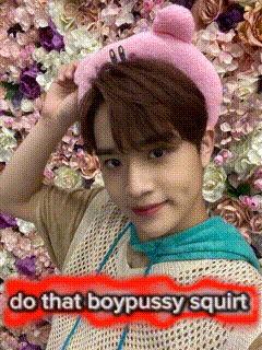 a young man wearing a pink kirby headband with the words do that boypussy squirt on it