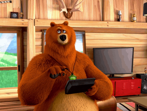 a teddy bear with a lanyard around his neck holds a tablet