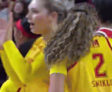 the number 2 is on the back of a yellow jersey