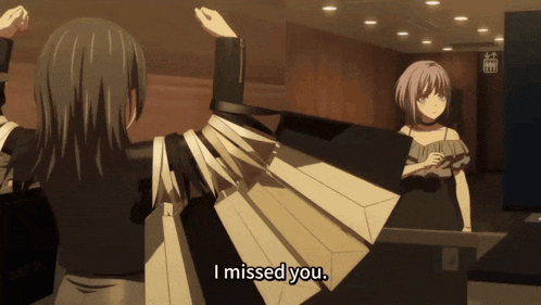 a woman holding a bunch of shopping bags says " i missed you "