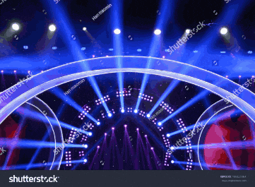 a stage with a lot of lights on it and the word i love you