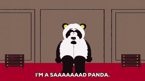 a cartoon character is dressed as a panda and says i 'm a saaaaad panda