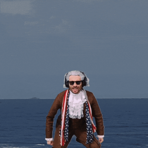 a man in an american flag outfit is jumping in the air with the word chaos written above him
