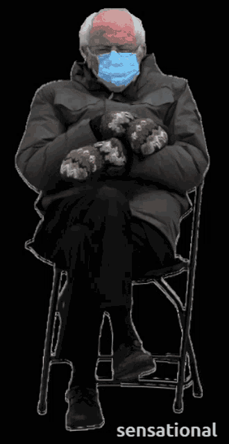 a man wearing a mask and mittens sits in a chair