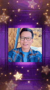 a man wearing glasses and a plaid shirt is surrounded by stars
