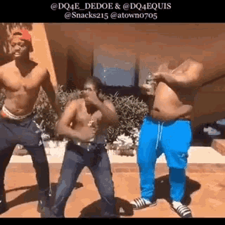 a group of men without shirts are dancing in a video .