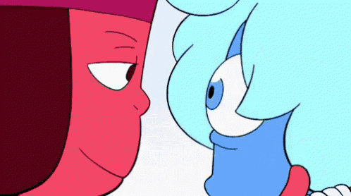 two cartoon characters , ruby and sapphire , are looking at each other with their eyes closed .