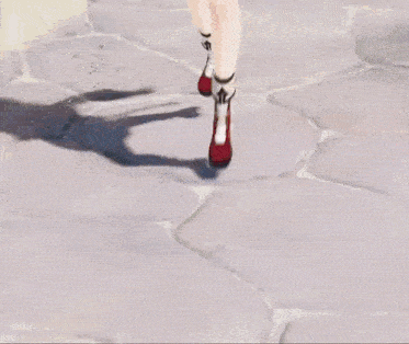 a close up of a person 's legs in a video game with a red jacket and shorts .