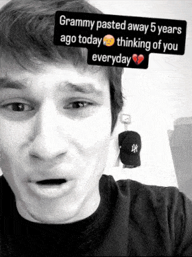 a black and white photo of a man with a caption that says " grammy pasted away 5 years ago today thinking of you everyday "