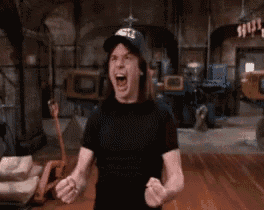 a man wearing a hat that says eagles is screaming with his mouth open