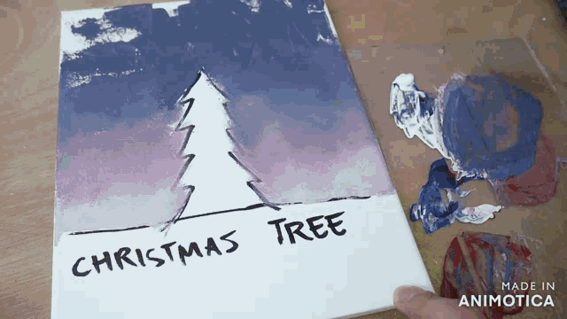 a painting of a christmas tree is being made in animatica