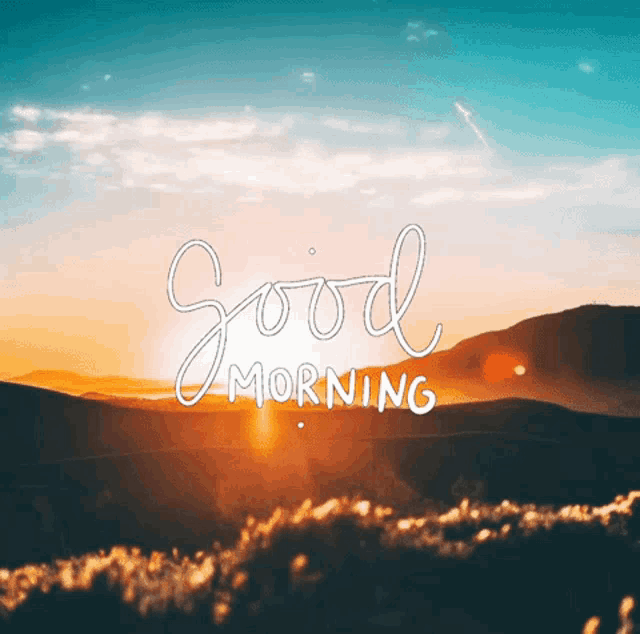 a picture of a sunset with the words " good morning " on it