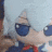 a close up of a stuffed animal wearing sunglasses and a tie .