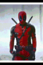 a man in a deadpool costume is standing in front of a window in a room .